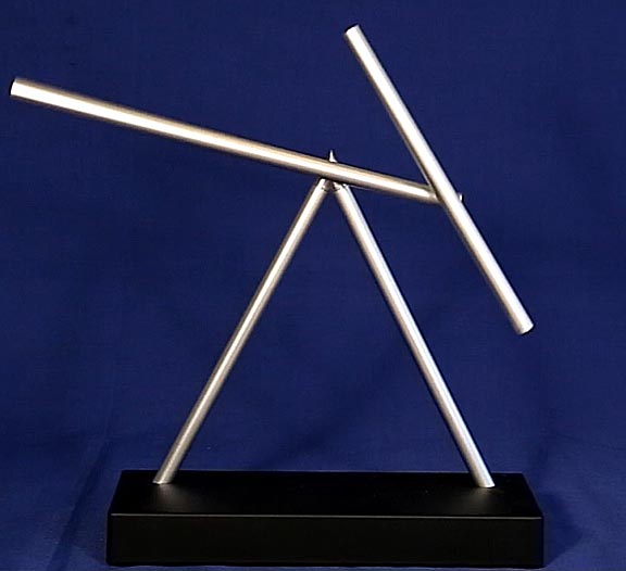 spinning sticks kinetic desk sculpture